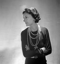 Coco Chanel wearing pearls
